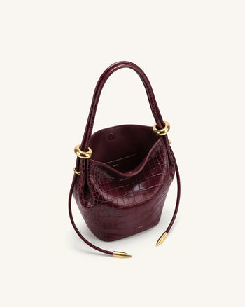 Ellie Beuteltasche mit Metallring-Verzierung - Burgund Krokodiloptik