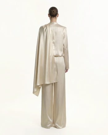 Asymmetrisches Cape-Oberteil mit hohem Kragen und Drapierung - Creme