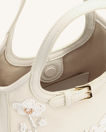 Brooke Mini-Handtasche mit Gürtel und verzierter Orchideenperlenstickerei - Elfenbein