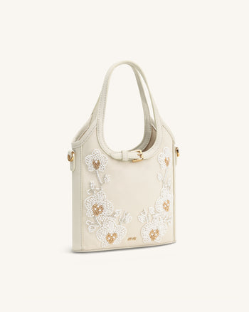 Brooke Mini-Handtasche mit Gürtel und verzierter Orchideenperlenstickerei - Elfenbein