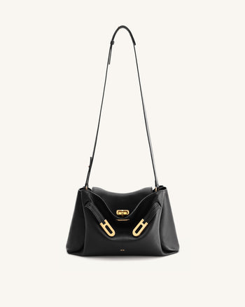 Rhea Schultertasche mit doppelter Schnalle und Narbenlederstruktur - Schwarz