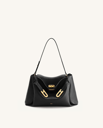 Rhea Schultertasche mit doppelter Schnalle und Narbenlederstruktur - Schwarz