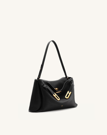 Rhea Schultertasche mit doppelter Schnalle und Narbenlederstruktur - Schwarz