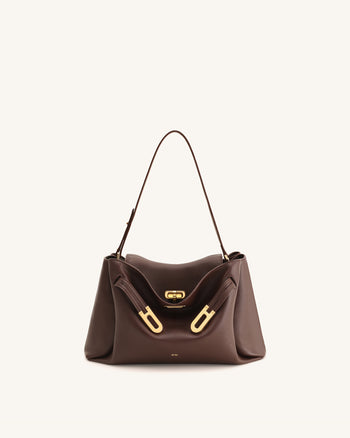 Rhea Schultertasche mit doppelter Schnalle und Narbenlederstruktur - Dunkelbraun