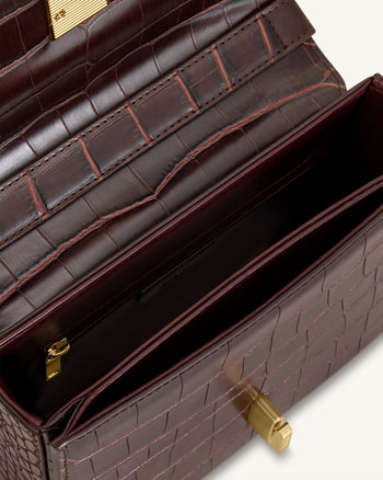 Evania Schultertasche mit Schloss-Detail - Burgunderrot in Krokoprägung
