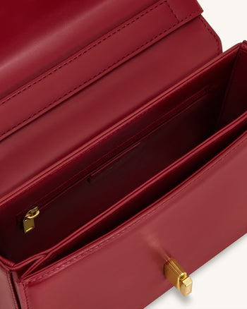 Evania Schultertasche mit Schloss-Detail - Rot