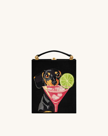 Taya-Clutch in Buchform mit Welpenmuster – Schwarz