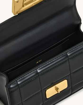 Kaia Handtasche mit Metallgriff und Bambusoptik – Schwarz