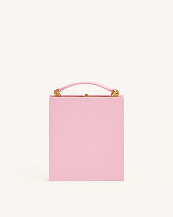 Taya-Clutch in Buchform mit Welpenmuster - Rosa