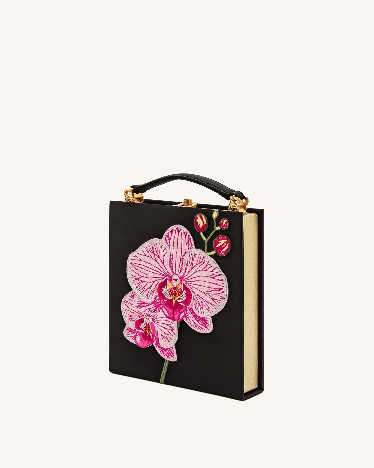 Taya Clutch in Buchform mit Orchideenmotiv – Schwarz