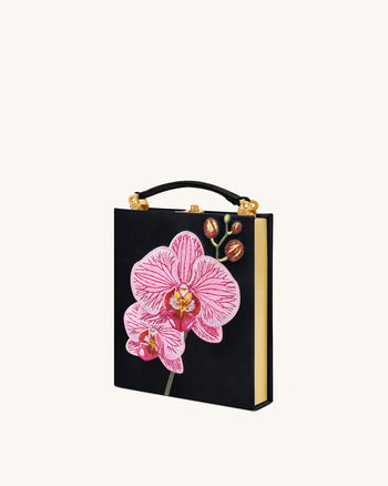 Taya Clutch in Buchform mit Orchideenmotiv – Schwarz