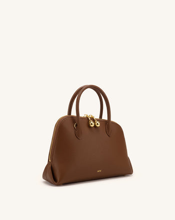 Nerina Kuppelförmige Handtasche in genarbter Optik – Braun