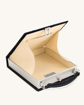 Taya Clutch-Tasche in Buchform mit Weinglas-Welpenmuster - Schwarz