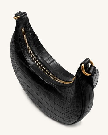 Carly Saddle Tasche - Krokodilprägung in schwarz
