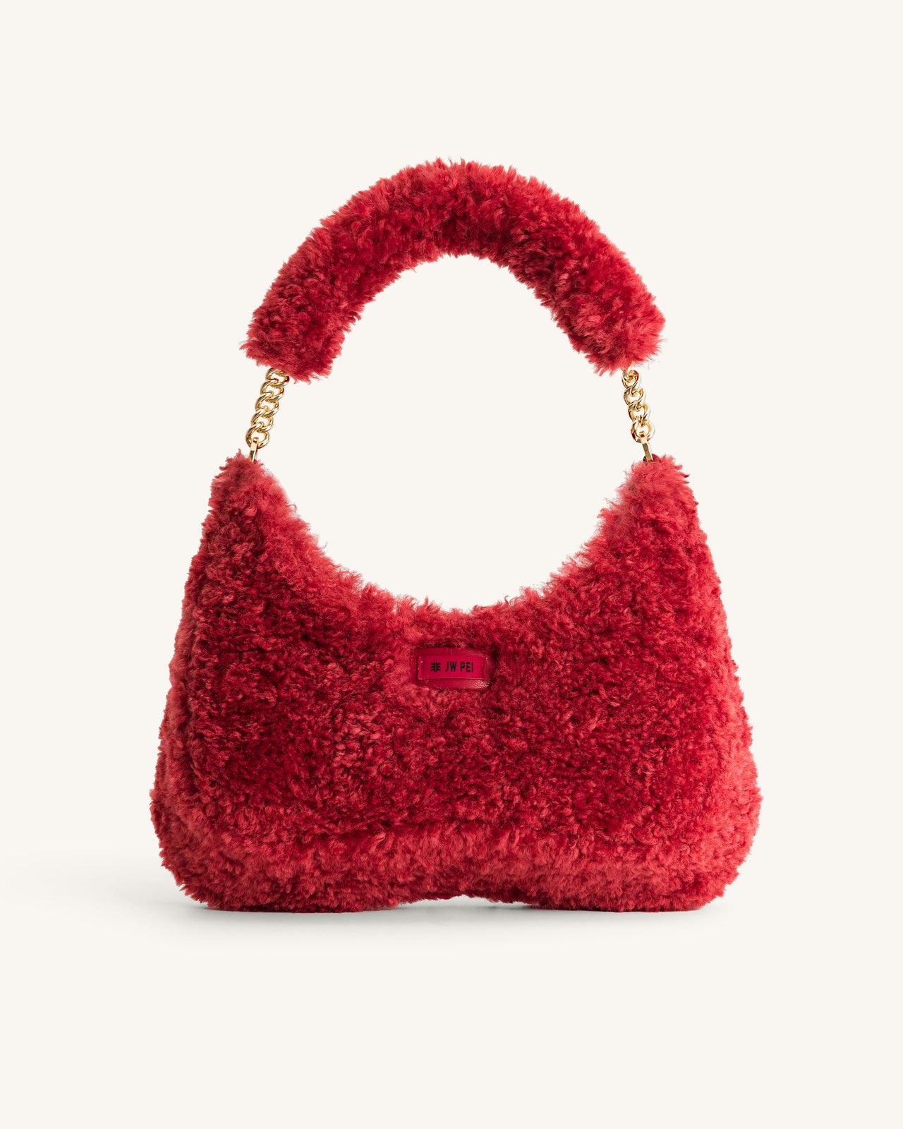 Ruby Schultertasche aus Kunstpelz - Magenta