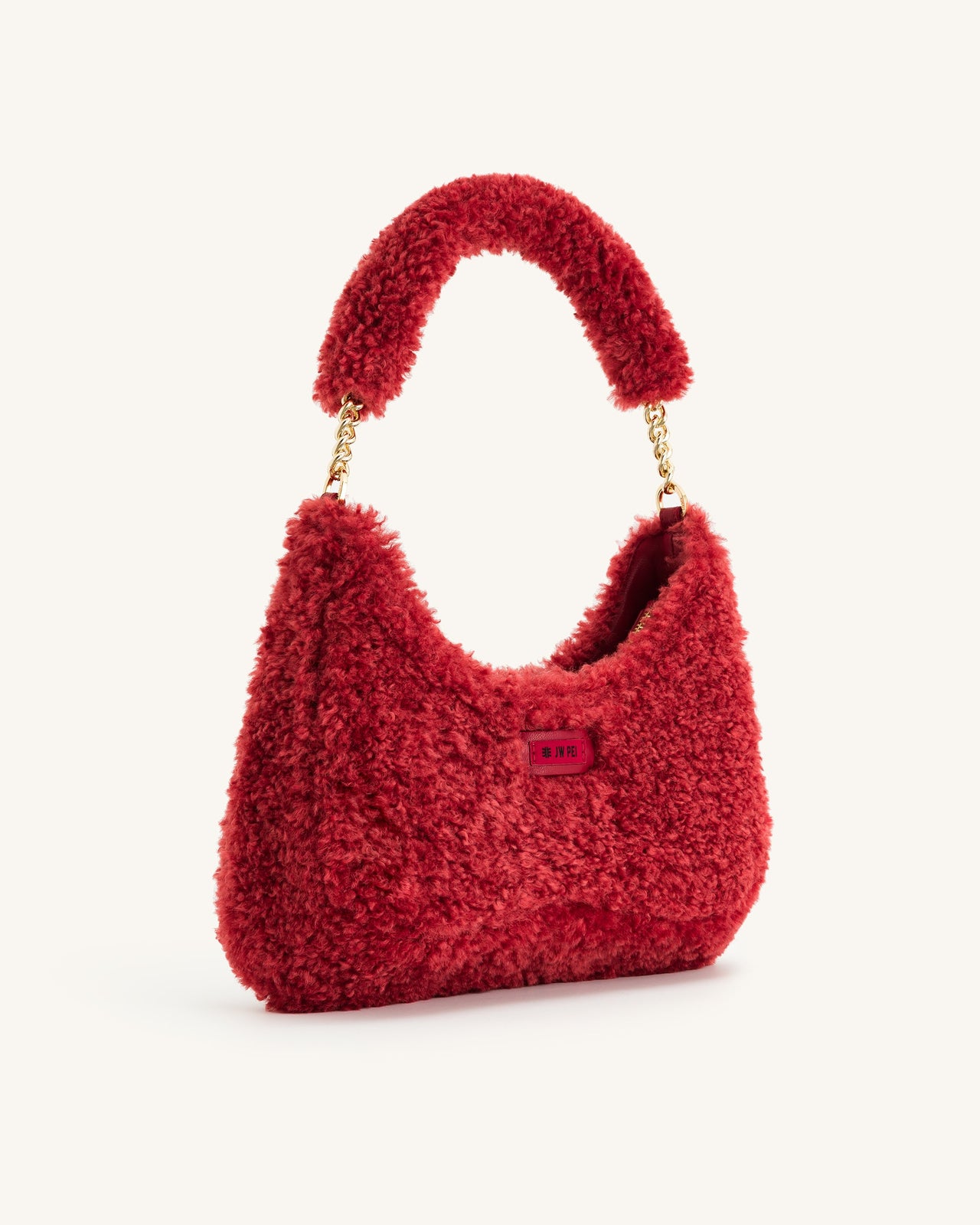 Ruby Schultertasche aus Kunstpelz - Magenta